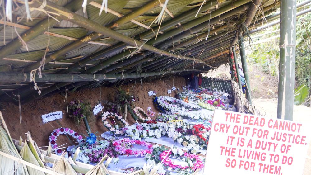 The graves of 13 out of the 14 youths who were killed by security forces at Oting on December 4 and 5. (Morung Photo)